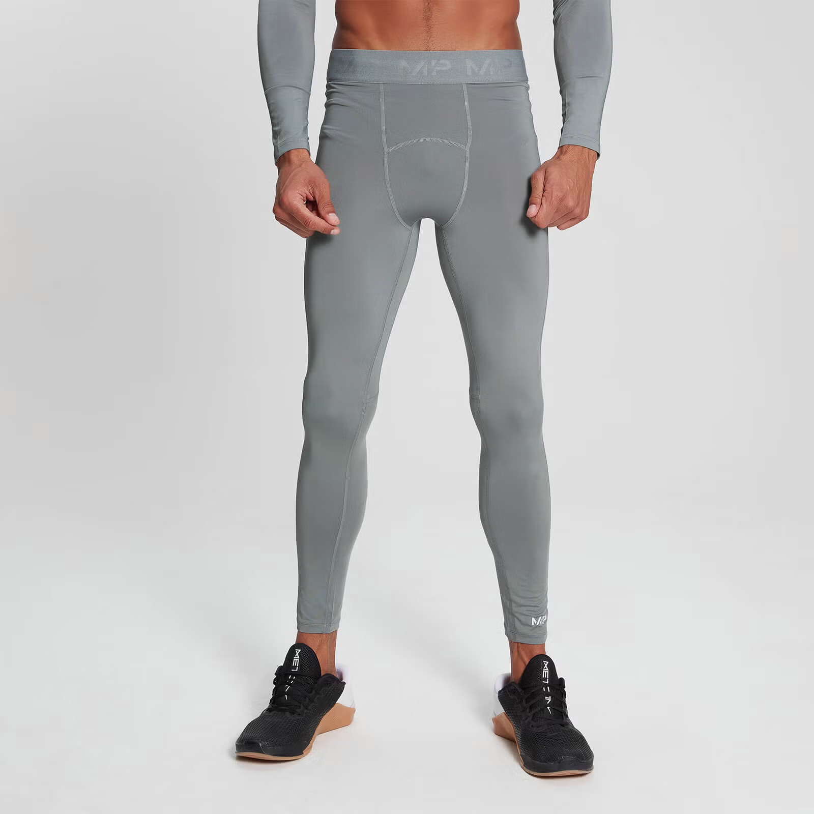 Levně MyProtein Pánske legíny Essentials Training Baselayer storm XXL